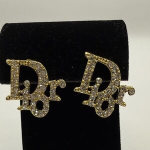 Di or Sparkling clear crystals Gold tone stud earrings log letters NEW